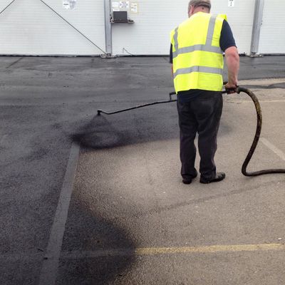 ASPHALT SEALCOATING